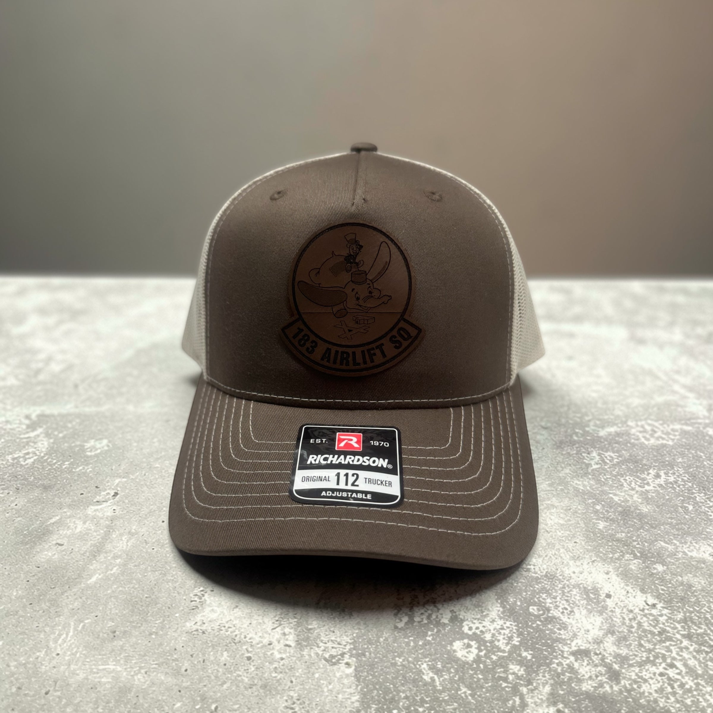Richardson 112 183 AS Leather Patch with C-17 embroidered on the back.